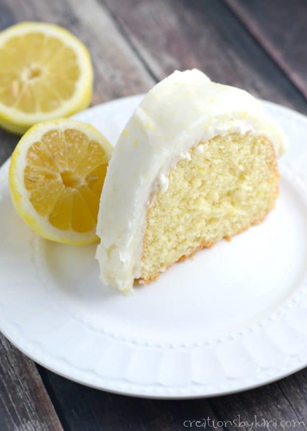 lemon cake on a plate with lemons