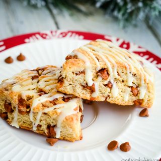 plate of eggnog scones drizzled with glaze