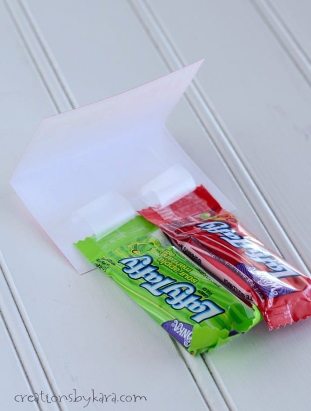 folding card with laffy taffy candy taped inside