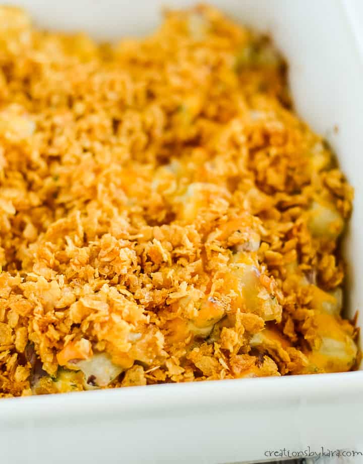 pan of cheesy ranch potatoes topped with buttery crushed corn flakes