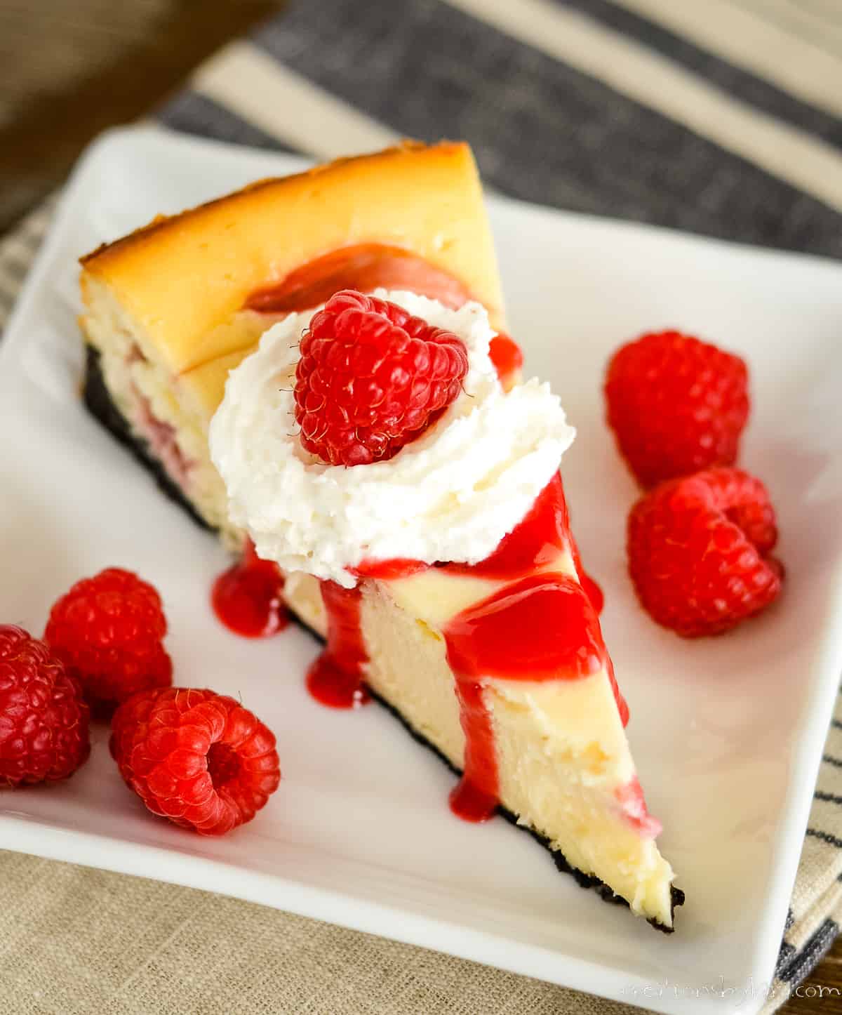 https://www.creationsbykara.com/wp-content/uploads/2023/11/White-Chocolate-Raspberry-Cheesecake-23-2.jpg