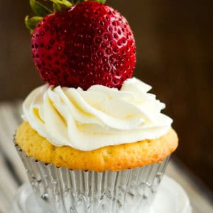 pound cake cupcake with whipped cream frosting