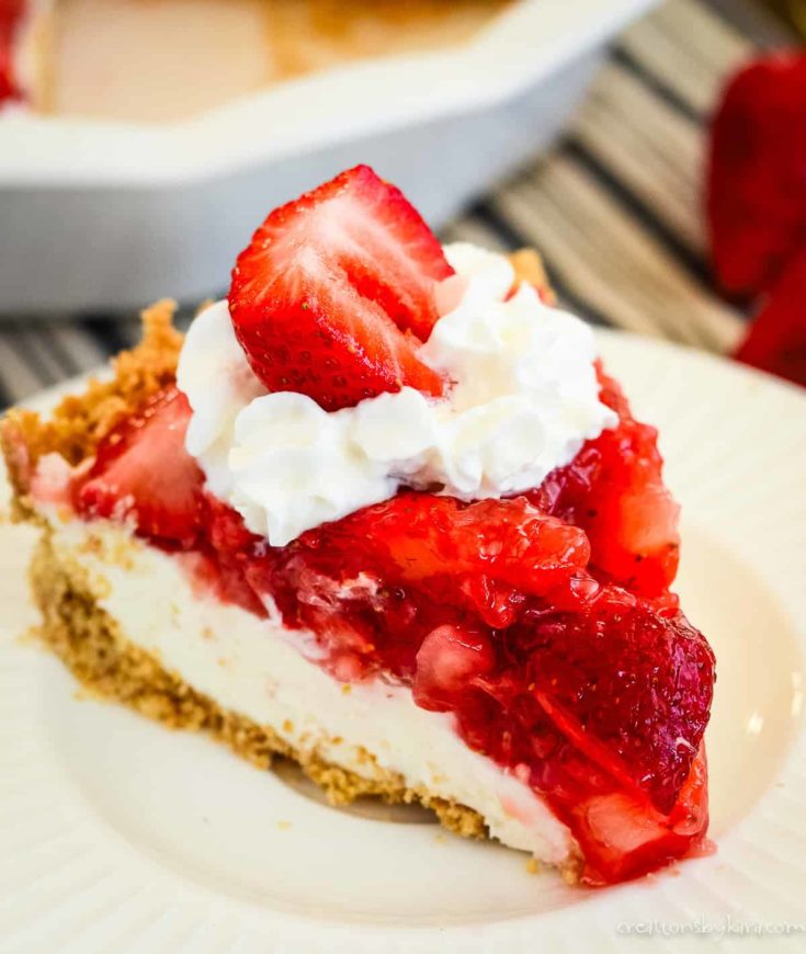 slice of strawberry cream pie with graham cracker crust