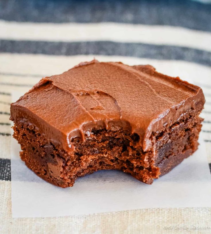 chocolate frosted brownie on a piece of waxed paper