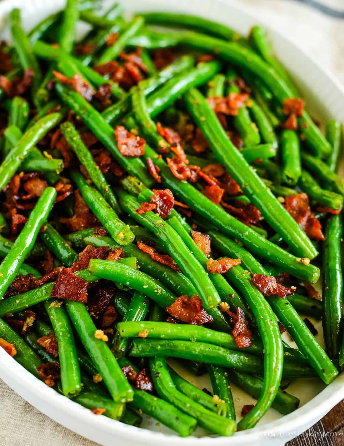 dish of sauteed green beans with bacon