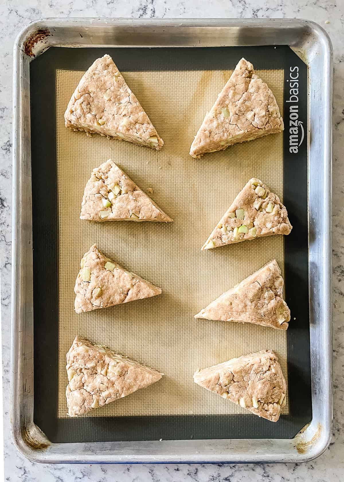 baking sheet with unbaked apple scones