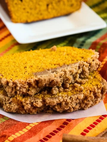 slices of pumpkin bread with streusel topping