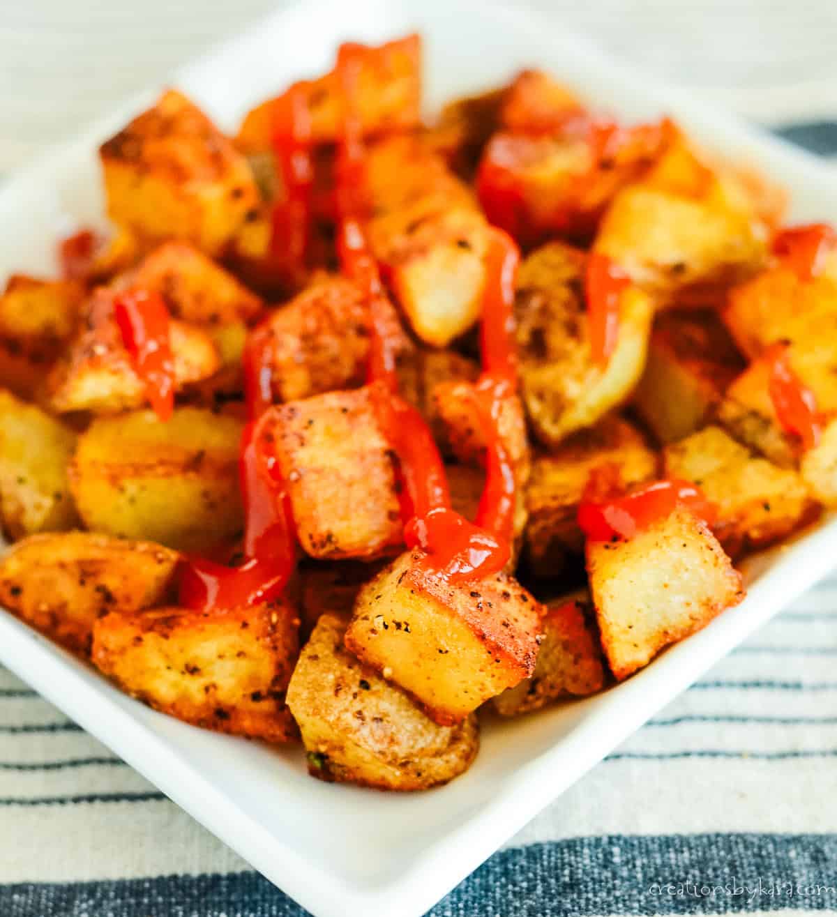 crispy sauteed potatoes with ketchup