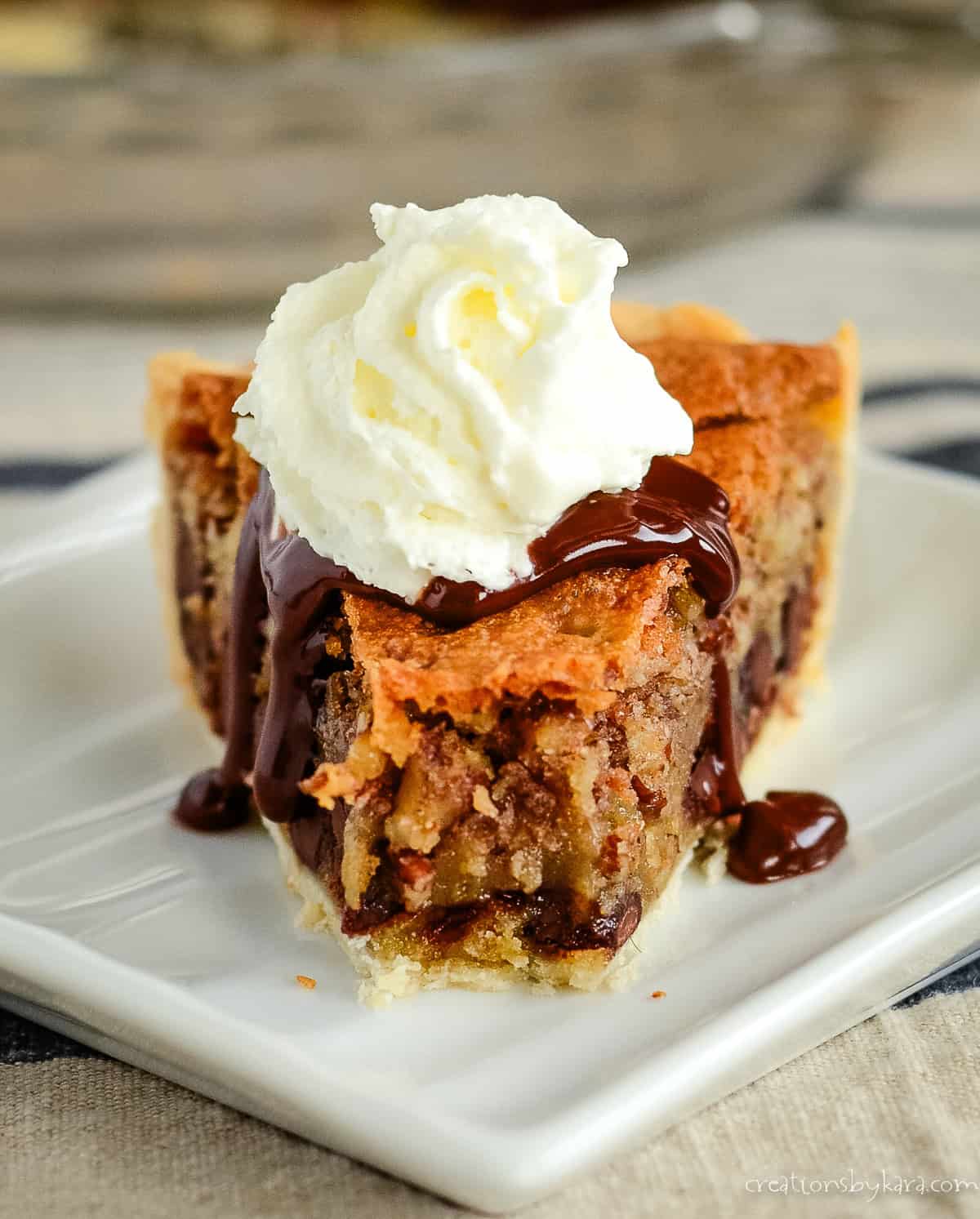 chocolate chip pie with hot fudge and whipped cream