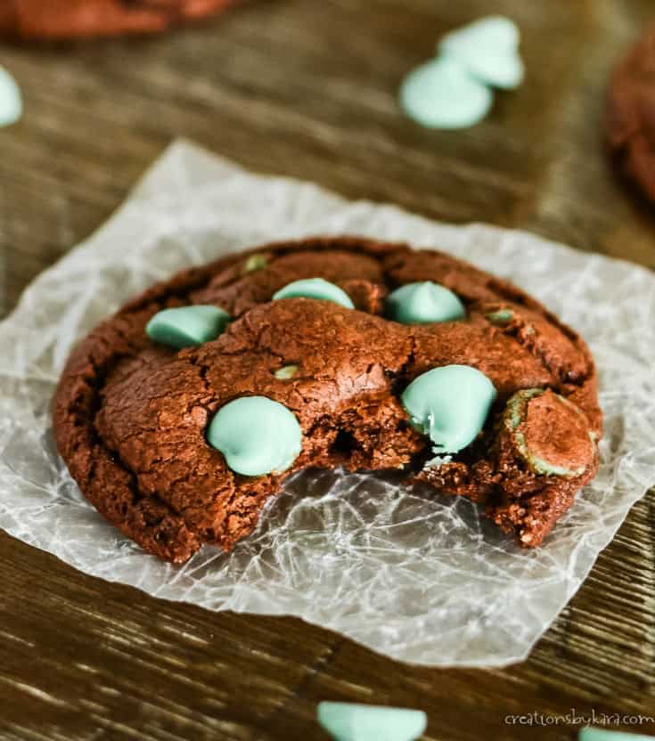 chocolate mint chip cookie with a bite taken out of it