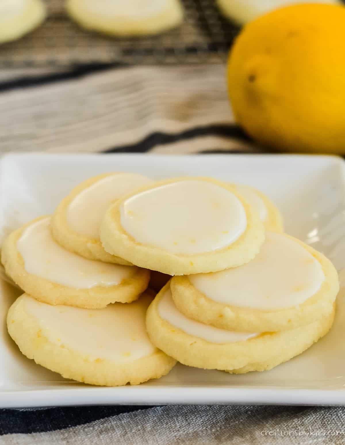 plate of italian lemon cookies with lemon glaze