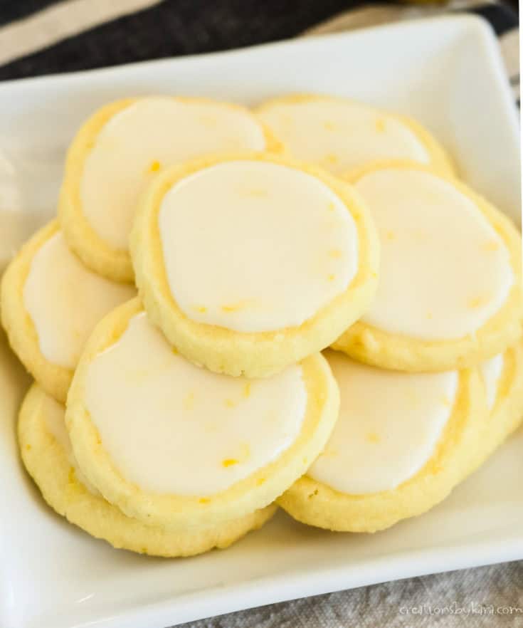 pile of glazed Italian lemon cookies on a plate