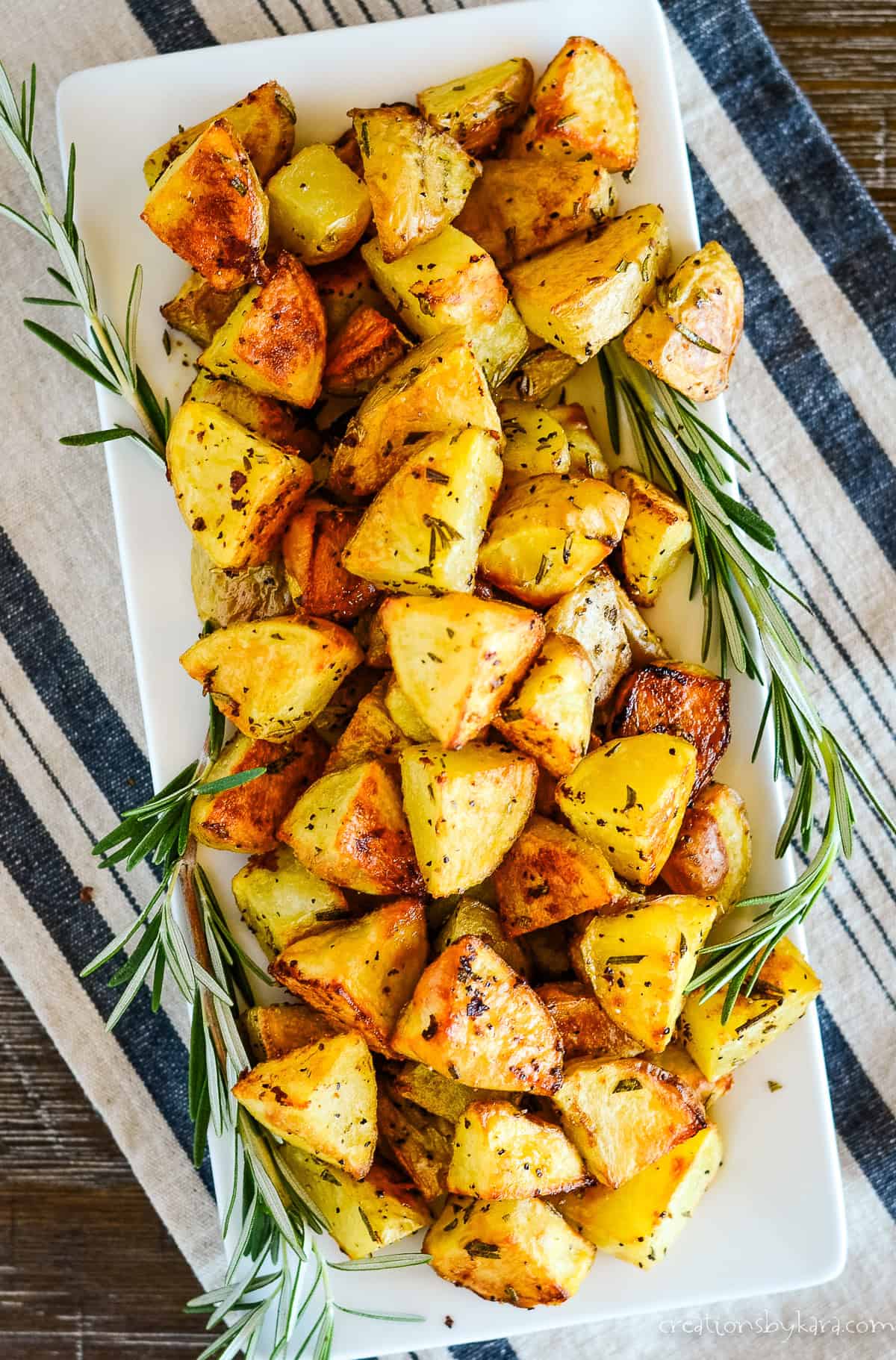 overhead shot of platter of oven roasted rosemary potatoes