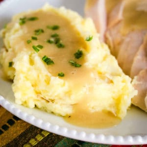 turkey gravy with drippings over mashed potatoes