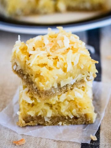 chewy coconut bars with buttery shortbread crust