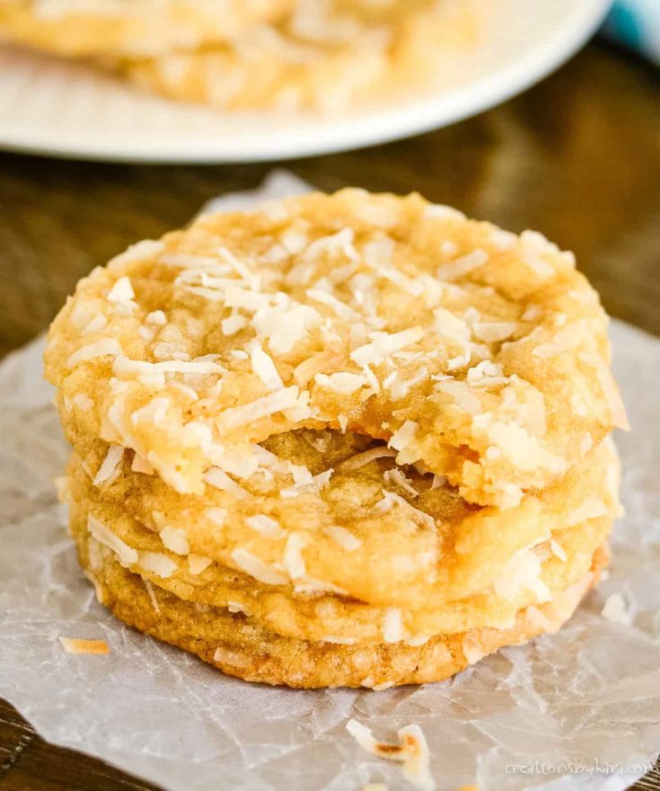 stack of coconut cookies on waxed paper