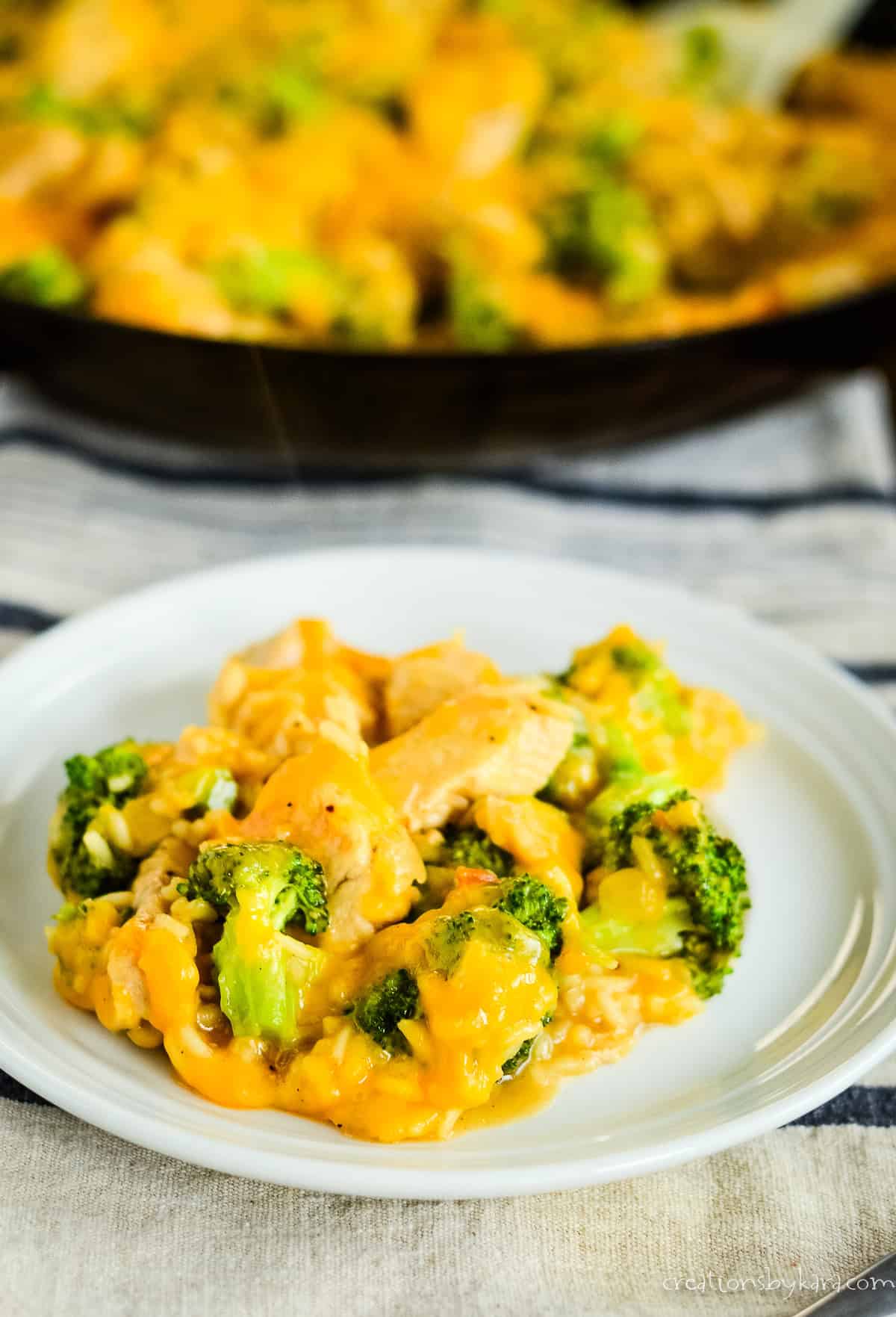 plate of chicken broccoli rice casserole with cheese