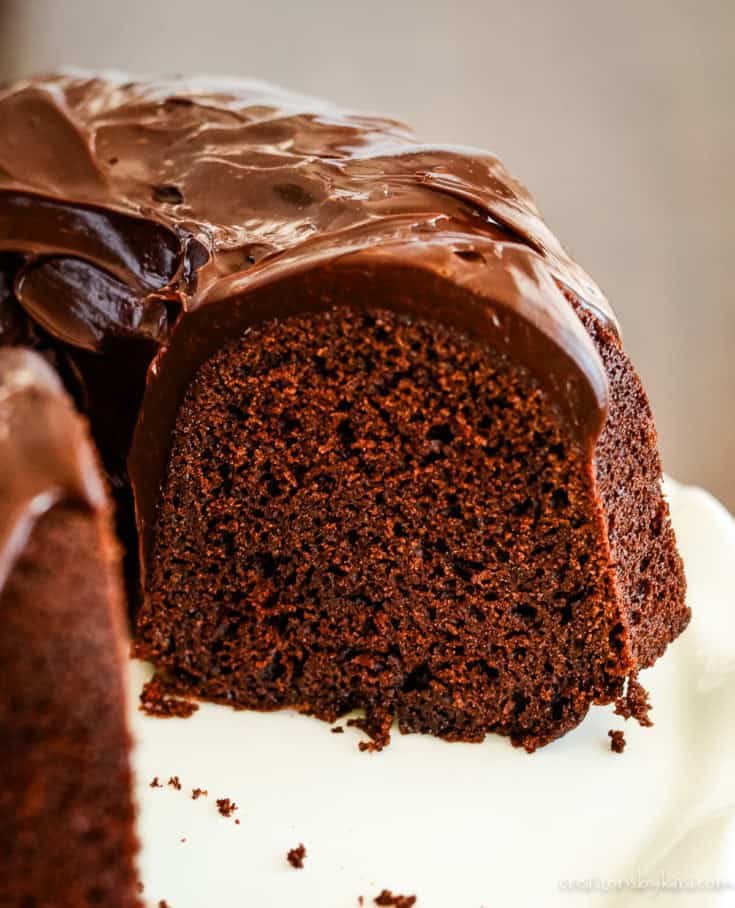 sliced chocolate brownie cake on a cake plate